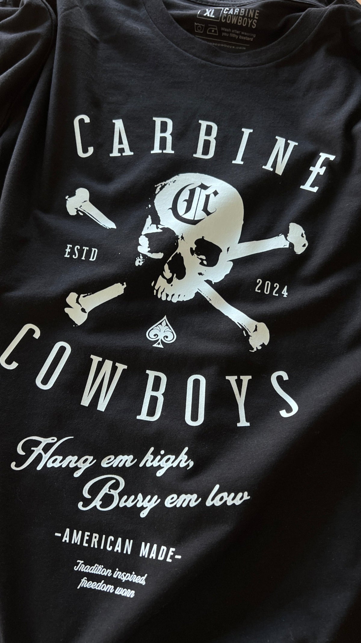 Black Carbine Cowboys Hang Em High tee front. American-Made, Tradition-Inspired, Freedom-Worn.
